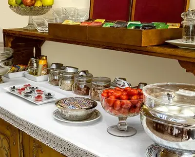 a counter with bowls of fruit and other items on it at Hotel Bramante in Rome