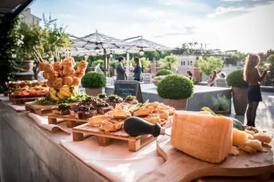 a buffet of different types of food on a table at Hotel Ponte Sisto in Rome
