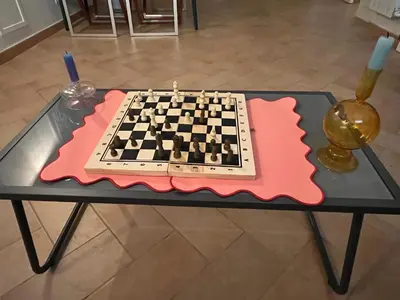 a chess board on a table with candles on it at Peaceful hidden gem near Metro A and Colosseum in Rome