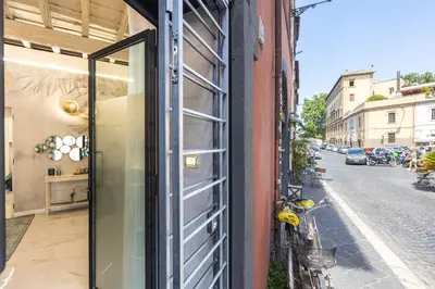 a glass door on a building with a street at Carpe Diem by Rental in Rome in Rome