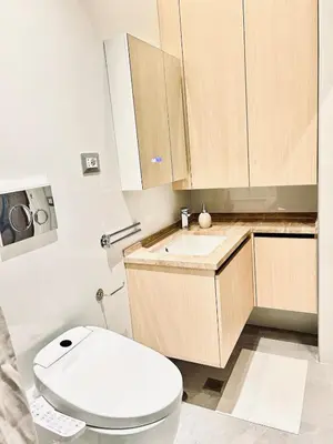 a bathroom with a toilet and a sink at Luxury Nest Ponte Milvio in Rome