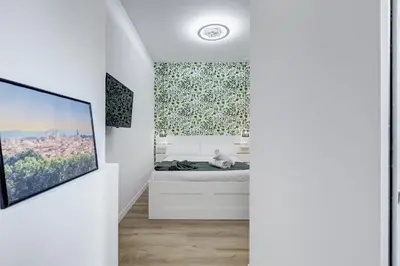 a bedroom with a bed and a window at New opening Ponte Milvio in Rome