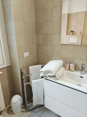 a small bathroom with a sink and a toilet at B&B A casa da Mami in Rome