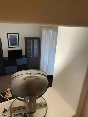 a room with a toilet in the corner of a room at Rome City Center Apartment in Rome