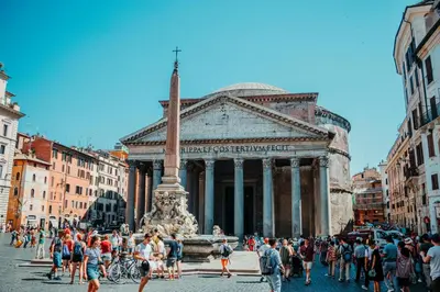 a group of people standing in front of a building at Maison Barchetta in Via Giulia in Rome