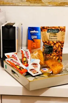 a package of food sitting on a counter at Crezy House Trilussa in Rome