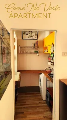 a small kitchen with a counter top and a counter top at Come' Na Vorta Apartment in Rome
