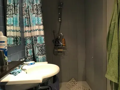 a bathroom with a sink and a shower at Roma, Città degli Uomini in Rome