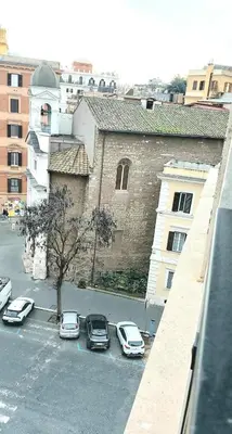 a group of cars parked in a parking lot at Dodo's luxury house in Santa Maria Maggiore in Rome