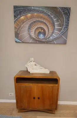 a painting of a shoe on top of a wooden table at Bijoux de Rome Campo dei Fiori Apart in Rome