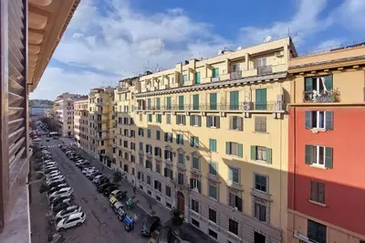 an aerial view of a city street with buildings at New Comfortable 2 Br Della Vittoria by Halldis in Rome