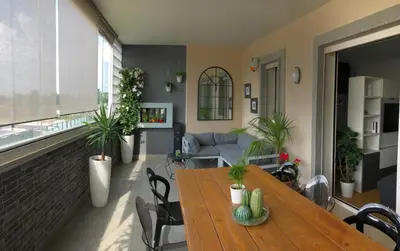 a living room with a table and a couch at Modern Loft Private in Rome