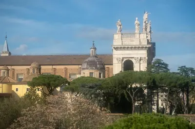 a large building with trees in front of it at Divine View Apartment in Rome