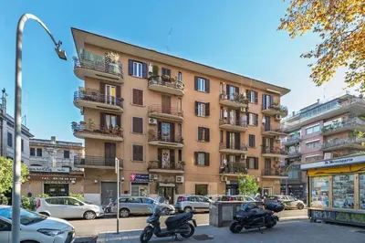 a group of motorcycles parked in front of a building at La Eterna Dimora in Rome