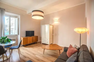 a living room with a couch and a table at Cappellari Campo dei Fiori int 3 in Rome