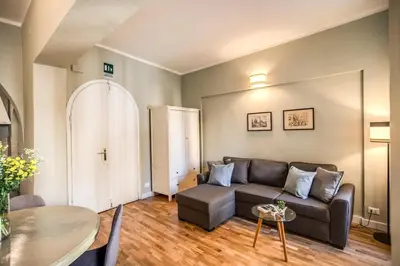a living room with a couch and a table at Cappellari Campo dei Fiori int 5 in Rome