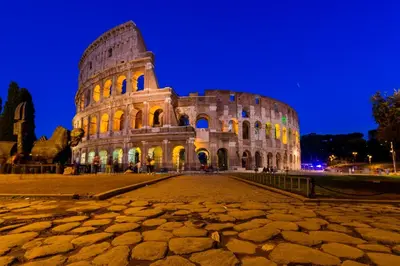 a view of the colosseum at night at Vaticano-Metro A, Penthouse with AC, Wi-Fi e Netflix in Rome