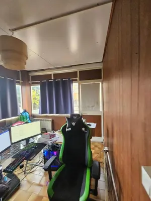 an office with a desk with a computer and a chair at CS Banchetto Apt 2 pax in Rome