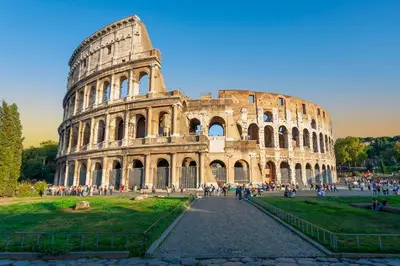 a large building with people standing in front of it at Calm Home - Center Rome in Rome