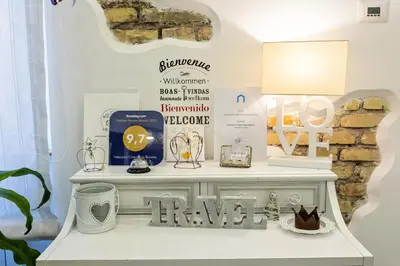 a shelf in a store with items on it at Vaticano Charming Rooms in Rome