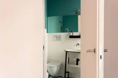 a bathroom with a toilet and a sink at Appartamento Piazza Bologna - very well connected to Colosseum and station in Rome
