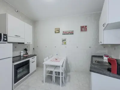 a bedroom with a bed and a tv in it at Casa Noemi in Rome