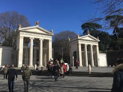 a group of people walking in front of a building at Twentythree Luxury Apartment in Rome