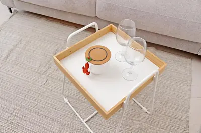 a table with two wine glasses and a necklace on it at La corte di San Paolo by DomusDimore in Rome