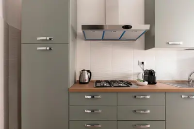 a kitchen with a stove and a counter top at Casa Laberio by Hili in Rome