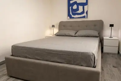 a large bed in a room with a large mattress at Luxury suite al Vaticano in Rome