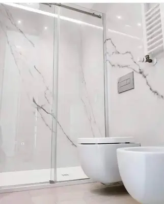 a white bathroom with a shower and a toilet at Exceptional near Vatican flat with swimming pool in Rome
