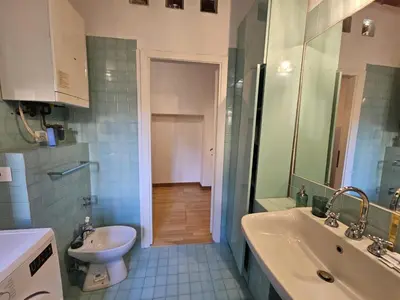 a bathroom with a sink and a toilet at Be Your Home - CasAngelica in Rome