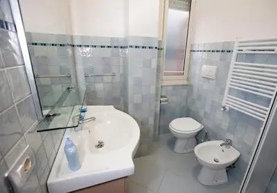a bathroom with a sink and a toilet and a shower at Il Punto in Rome