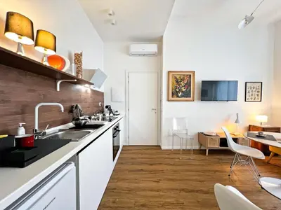 a kitchen with a sink and a counter top at Roma Parioli Suite Green Harmony in Rome
