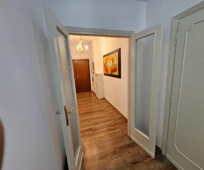 an empty hallway with a hallway leading to a room at Simone House in Rome