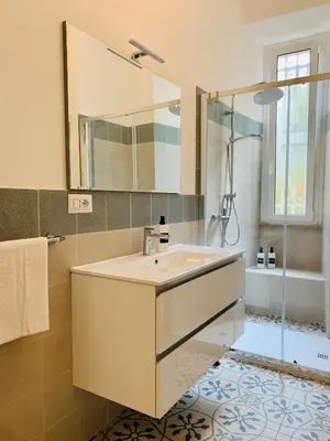 a bathroom with a sink and a shower at Gattamelata in Rome