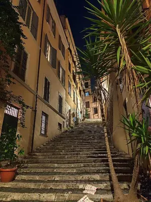 a stone stairway leading up to a building at COLOSSEUM Studio Flat in Rome