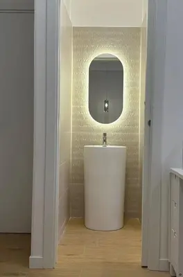 a bathroom with a white tub and a mirror at Maryam Vatican Suites in Rome