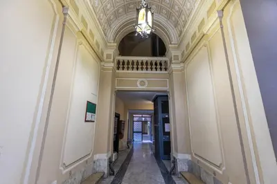 a hallway in a building with a ceiling at Monti House - City Center in Rome