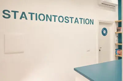 a sign for the institution of identification on a wall at Station To Station Rome Ensuite Rooms in Rome