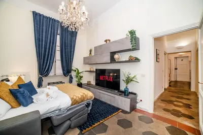 a bedroom with a bed and a fireplace at Stella Luxury House - Lombardia in Rome