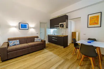 a living room with a couch and a table at Casa Cesari in Rome