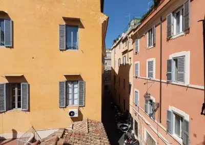 a view of an alley between two buildings at Roman heritage- Pantheon- up to 6 guests in Rome