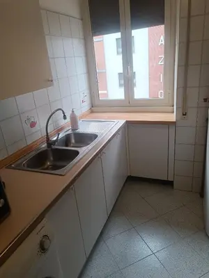 a small kitchen with a sink and a window at Teresa Amor INN Roma in Rome