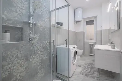 a bathroom with a shower and a toilet and a sink at Carlo's House Suite with Private Terrace in Rome