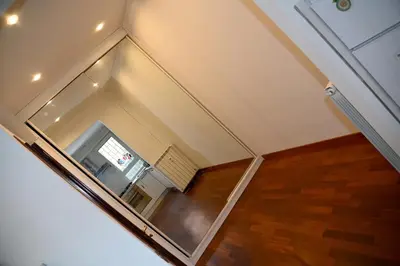 a view of a room with a glass wall at Casa 12 in Rome