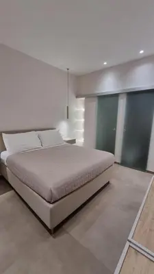 a bedroom with a large bed in a room at T&T Luxury Home Rome Int 5 in Rome