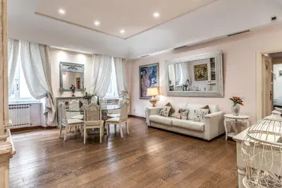 a living room with a couch and a table at Casa Vacanze Crispi little 1 in Rome