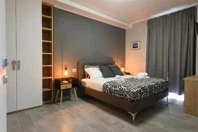 a bedroom with a king sized bed in a room at Domus Maria in Rome
