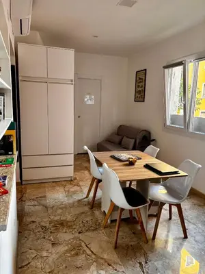 a bedroom with a bed with a laptop on it at Trastevere Ripa Apartments in Rome